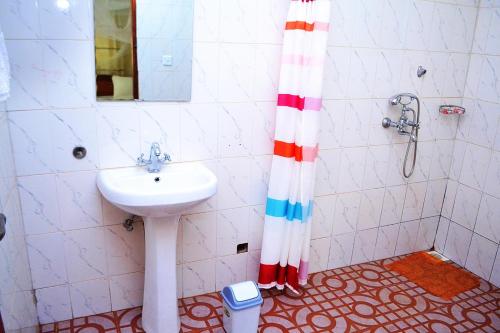 Ett badrum på Eco Resort Kasenyi