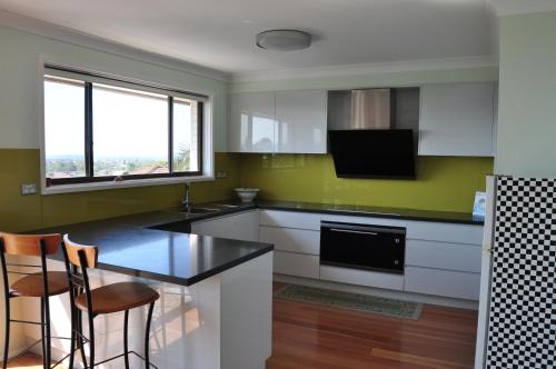 A kitchen or kitchenette at lake and ocean view