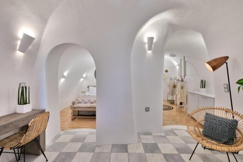 Postel nebo postele na pokoji v ubytování Namaste Suites by Oias Local Cavehouses
