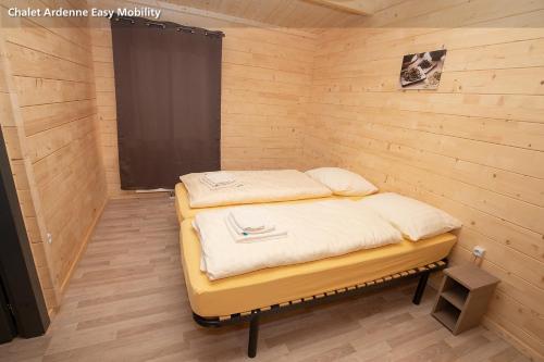 Una cama o camas en una habitación de Camping Kaul