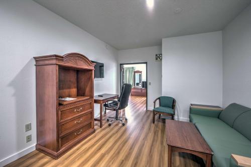 a living room with a couch and a desk at Motel 6-Dallas, TX - Northwest in Dallas