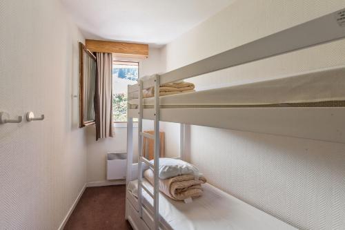 Katil dua tingkat atau katil-katil dua tingkat dalam bilik di Residence Le Sepia - maeva Home