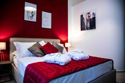 Кровать или кровати в номере Bespoke Roma Suites
