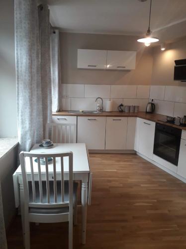 Dapur atau dapur kecil di Drzewna Apartamenty-Drzewna