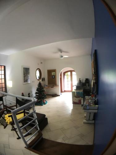 a view of a living room with a christmas tree at GH Bizkaia in Florianópolis