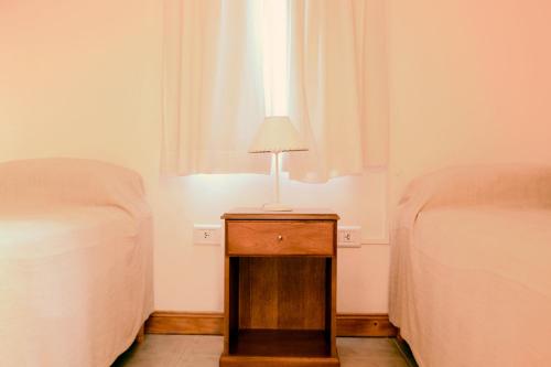 Postel nebo postele na pokoji v ubytování Complejo Sierras Blancas