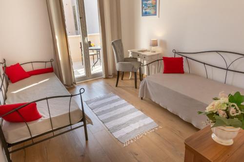 Ένα ή περισσότερα κρεβάτια σε δωμάτιο στο Villa Leonore