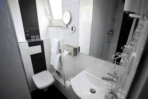 Ванная комната в Hotel Savoy Bonn