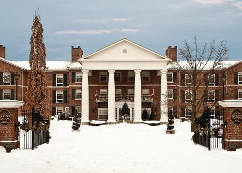 a large brick building with snow in front of it at Queens Landing in Niagara on the Lake