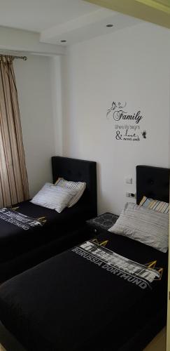Cama o camas de una habitación en Complexe kariat cabo