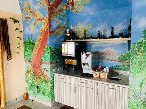 Η κουζίνα ή μικρή κουζίνα στο Island Suites Hobby Airport