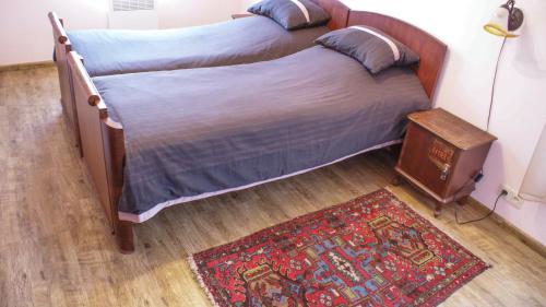 מיטה או מיטות בחדר ב-Takht House