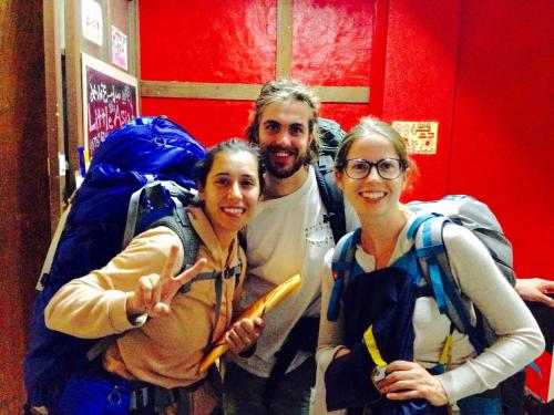 a group of three people posing for a picture at Little Asia Guest House in Naha