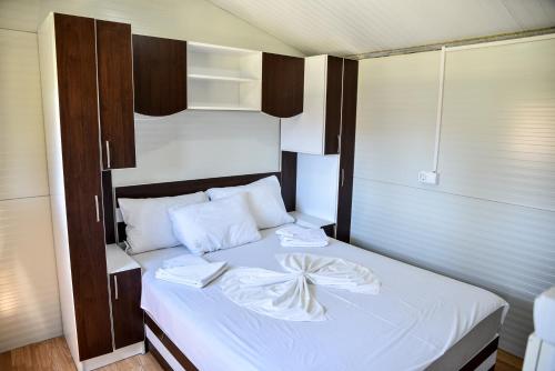 Krevet ili kreveti u jedinici u okviru objekta Mobile Homes Giovanni's beach Copacabana