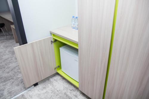 Kuchyň nebo kuchyňský kout v ubytování Aсe Hotel
