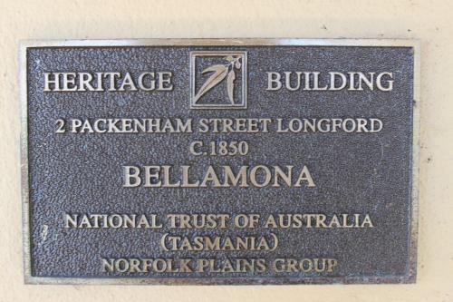 a sign for a building on aphaltphaltphaltphaltphaltphaltphaltphaltphalt at Bellamona Cottage Longford in Longford