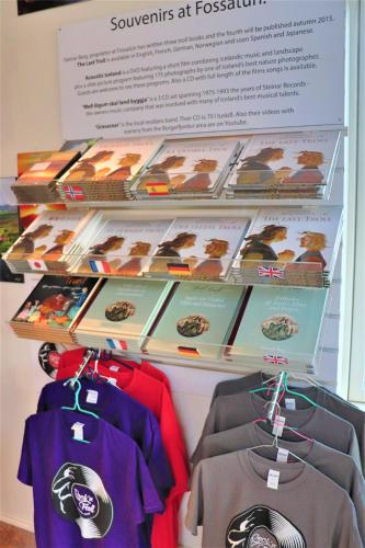 a display of shirts on hangers in a store at Fossatún Sunset Cottage in Fossatún