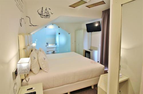 Voodi või voodid majutusasutuse Villa Ana Margarida Hotel toas