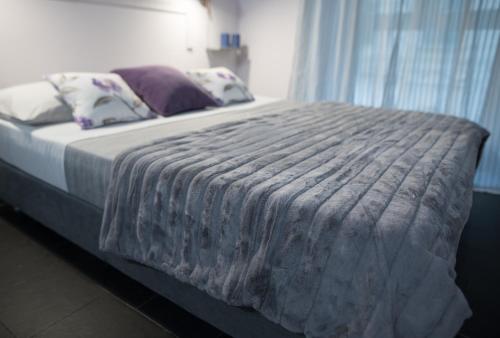 מיטה או מיטות בחדר ב-5 Terre Inn Affittacamere