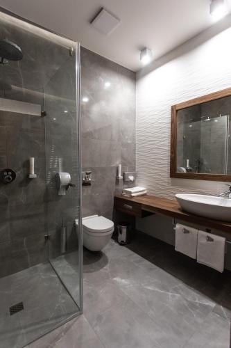 Koupelna v ubytování Artis Boutique Hotel