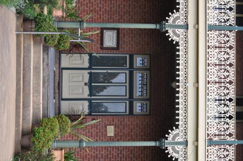 an overhead view of a building with windows and plants at Holmhurst Guest House in Bathurst