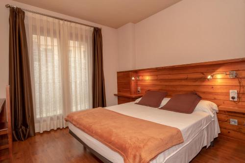 Katil atau katil-katil dalam bilik di Aparthotel Bellver