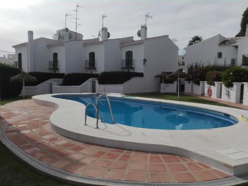 Bazén v ubytování Residencial los Pinos 3 nebo v jeho okolí