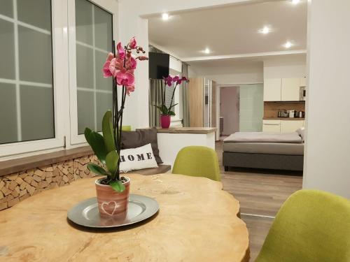 Ένα ή περισσότερα κρεβάτια σε δωμάτιο στο Echt Heimat Apartments