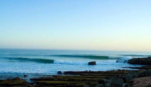 a large body of water with waves in the ocean at Boilers Surf House in Tamri