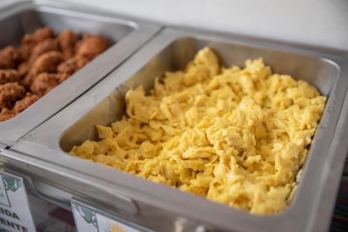 a plastic container filled with macaroni and cheese at Hotel Riviera Inka Paracas in Paracas