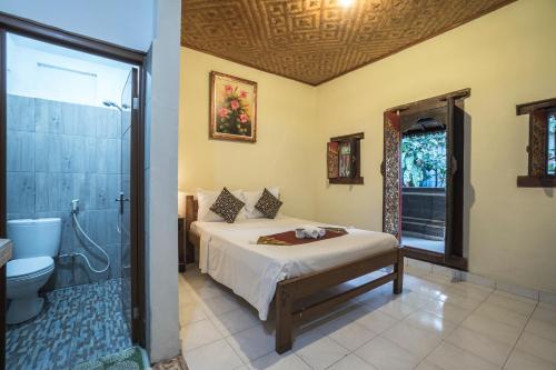 Cama o camas de una habitación en Tegar Guest House Ubud