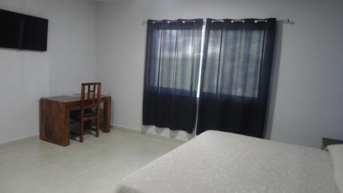 Ein Bett oder Betten in einem Zimmer der Unterkunft Hotel Tampico Express