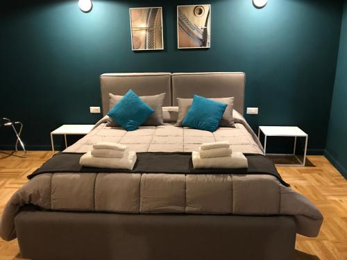 Кровать или кровати в номере Dama Suite