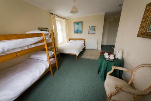 Katil atau katil-katil dalam bilik di The White Hart Hotel