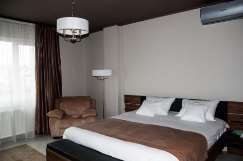 Postel nebo postele na pokoji v ubytování Rubio Residence - Frateria Apartment