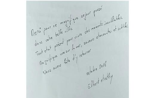 a piece of paper with handwriting on it at Fabuleuse villa Alizés vue mer, avec Staff et véhicule 4x4 in Ban Bang Po
