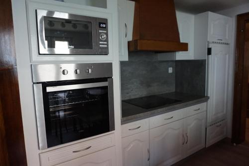 Dapur atau dapur kecil di Le 1820 - 3 Etoiles Premium
