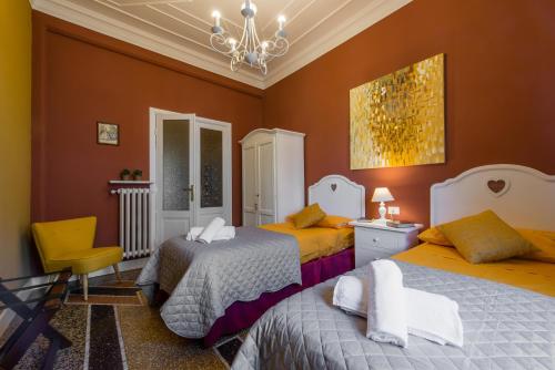 Postel nebo postele na pokoji v ubytování Casa Vittoria