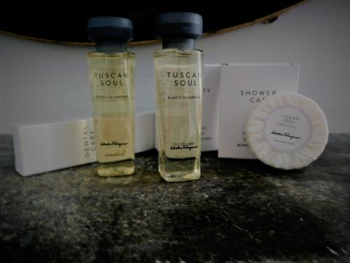 two bottles of tusayan soup sitting on a counter at B&B "La Bottega d'Arte" in Carrara