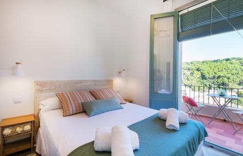 Postel nebo postele na pokoji v ubytování CASA DEL PI
