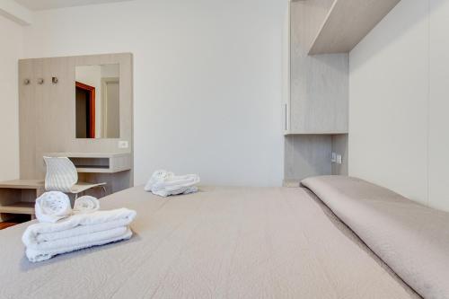 Postel nebo postele na pokoji v ubytování Hotel Riz