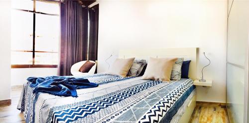 En eller flere senge i et værelse på Ideal apartamento en Torremolinos