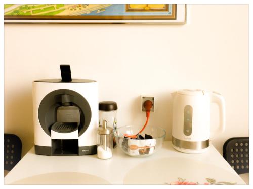 a coffee maker sitting on top of a counter at Apartament Katarzynka Stare Miasto in Toruń