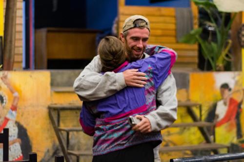 a man giving a woman a hug at Wander Thirst in Kathmandu