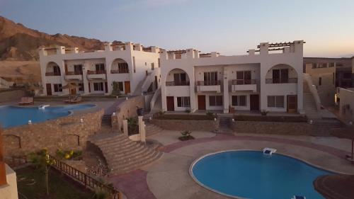 Bazén v ubytování Half Moon - Sunny Dahab resort nebo v jeho okolí