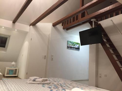 Ένα ή περισσότερα κρεβάτια σε δωμάτιο στο LORENZ Apartment 2