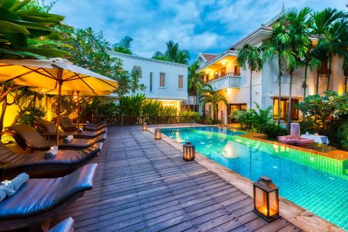 an image of a swimming pool at a villa at Mane History Lovers in Siem Reap