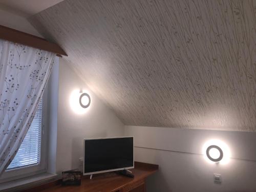 TV a/nebo společenská místnost v ubytování Hotel Bajt Maribor