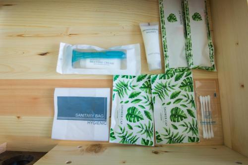 a group of products sitting on top of a table at Good Night Pool Villa Phuket - SHA Plus in Phuket Town