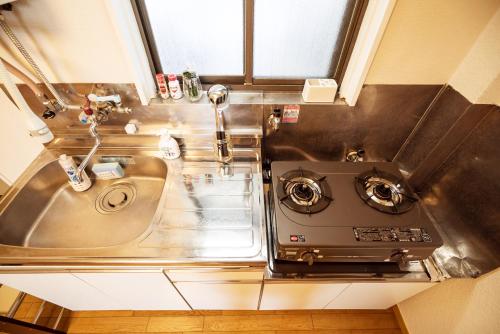 Kuchyň nebo kuchyňský kout v ubytování Murata Corpo 305